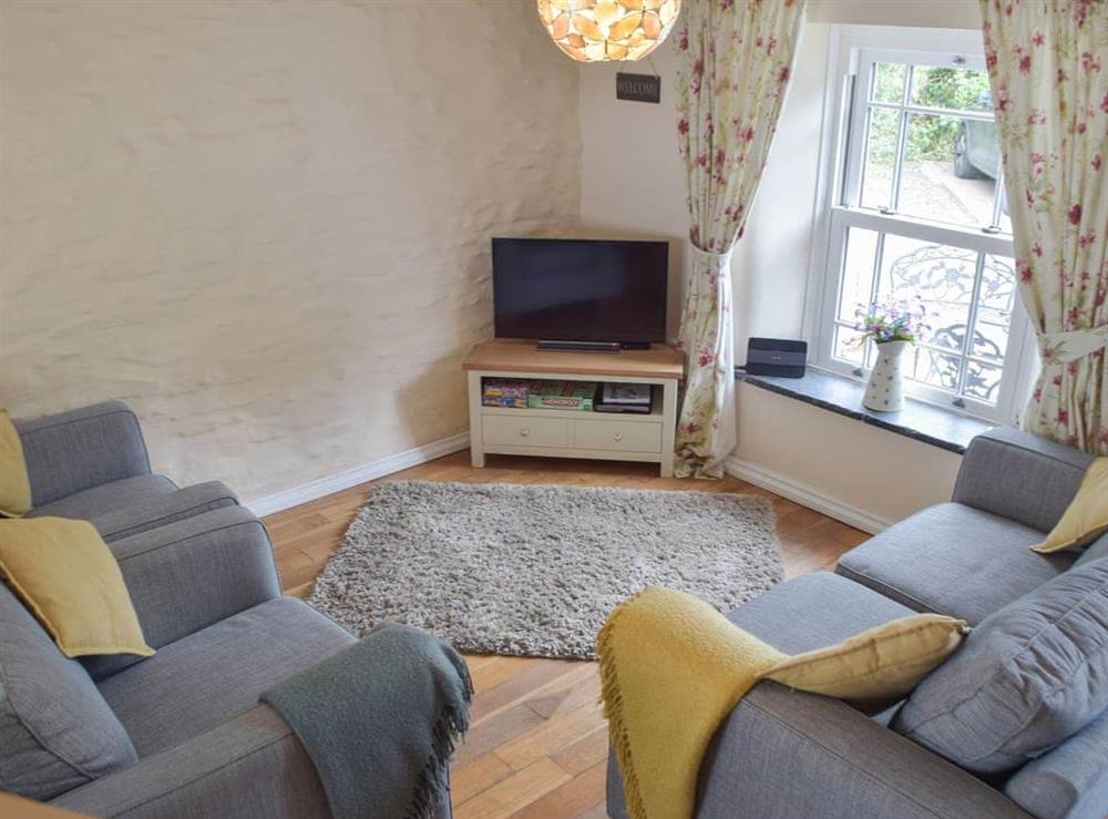 Living area at Guildford Bridge Cottage in Llangwm, near Haverfordwest, Dyfed