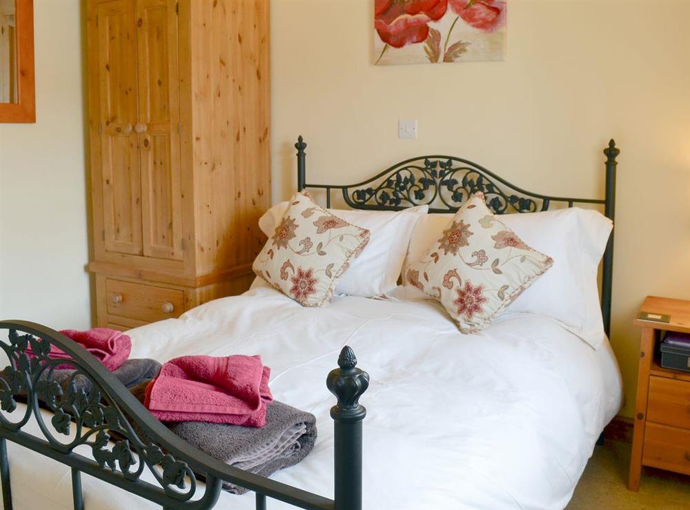 Cosy double bedroom at Guillemot Cottage in Buckton, near Flamborough, North Humberside