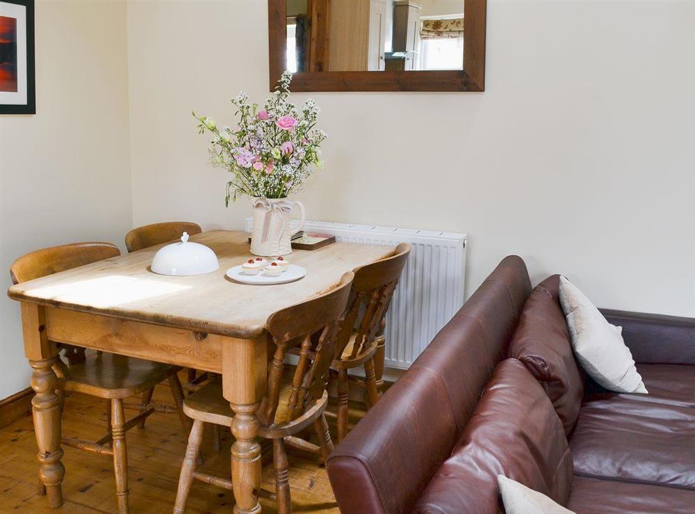 Quaint dining area at Guillemot Cottage in Buckton, near Flamborough, North Humberside