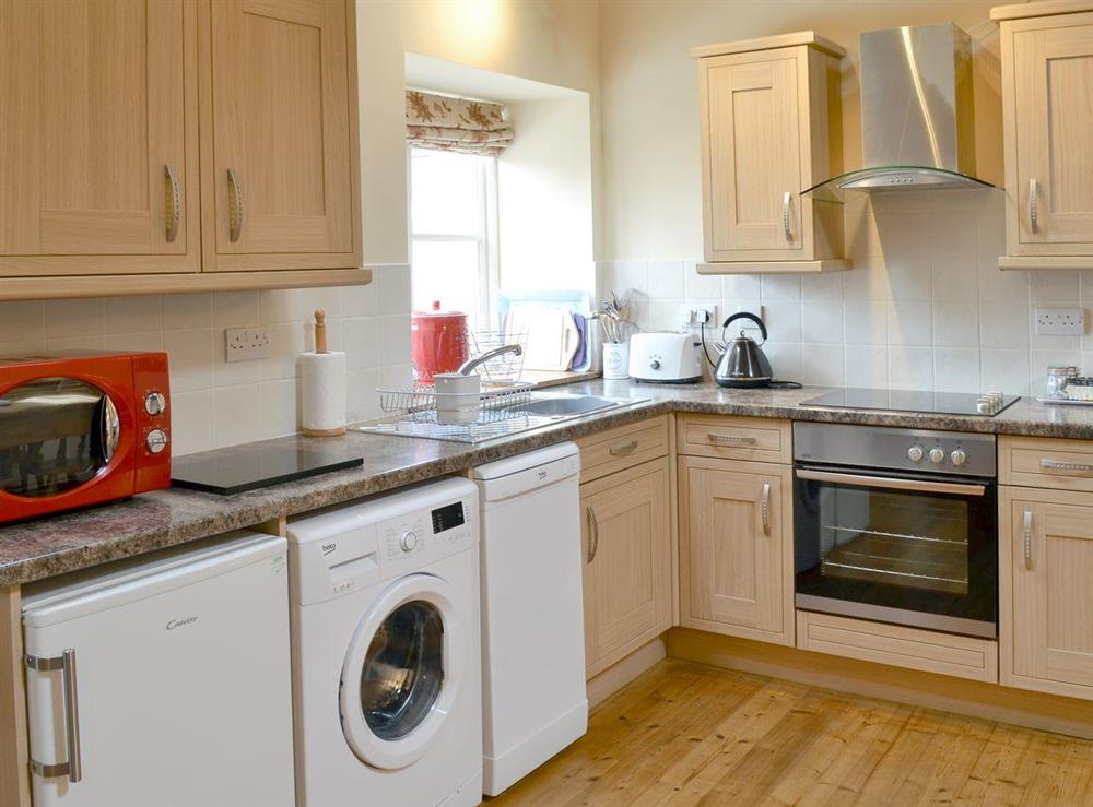 Well equipped kitchen at Guillemot Cottage in Buckton, near Flamborough, North Humberside
