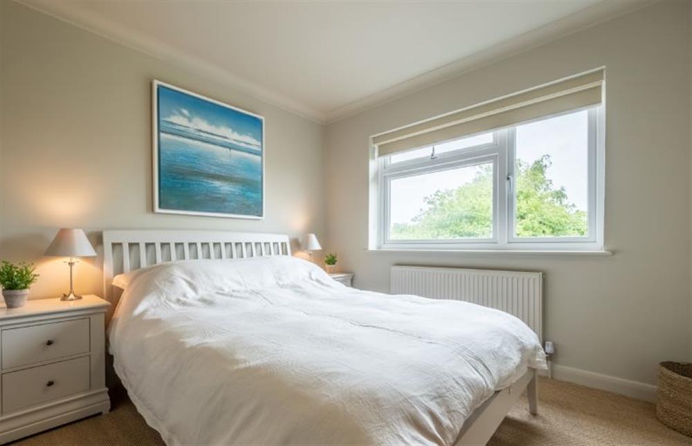 Bedroom three with a 5’ king-size bed at Gull Cottage, Holme-next-the-Sea