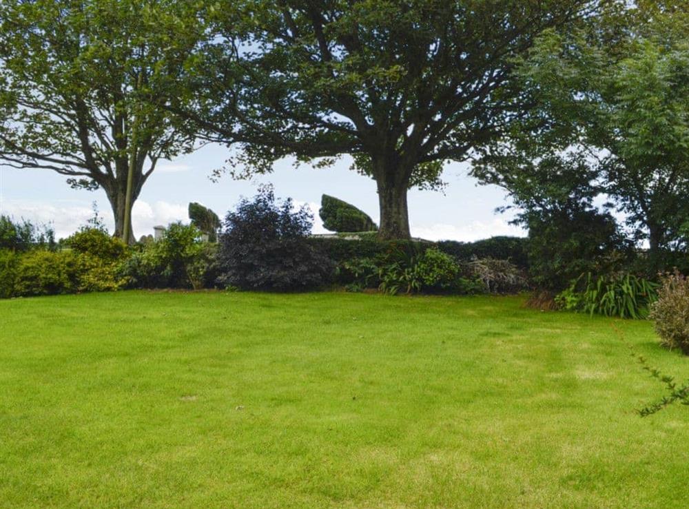 Peaceful garden with scenic views at Gullieside Cottage in Kirkandrews, near Kirkcudbright, Kirkcudbrightshire