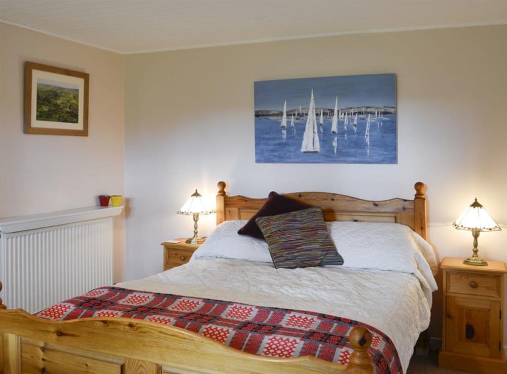 Relaxing bedroom with double bed at Gullieside Cottage in Kirkandrews, near Kirkcudbright, Kirkcudbrightshire