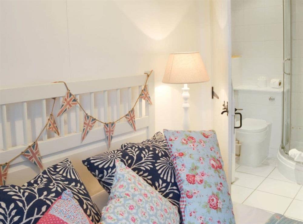 Comfy double bedroom with en-suite shower room at Gumburnville in Helstone, Camelford, Cornwall