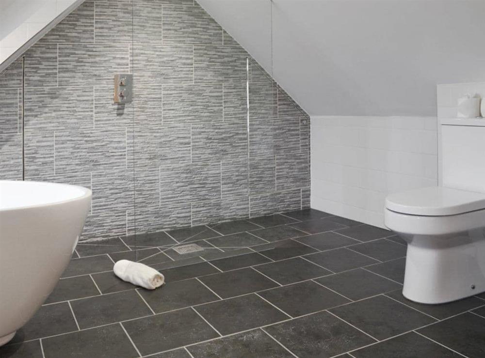 Fantastic wet room with free standing bath and shower area