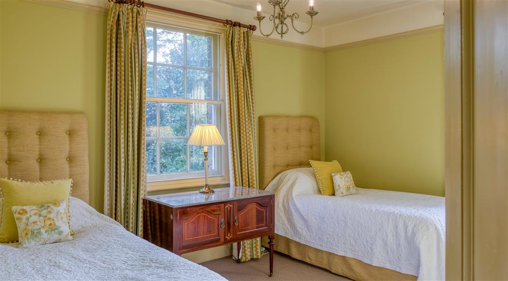 One of the twin bedrooms at Gunby Old Rectory in Skegness, Lincolnshire