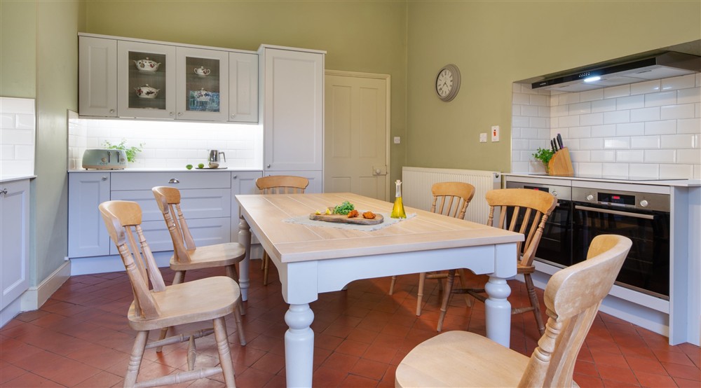 The kitchen with table for six (photo 2) at Gunby Old Rectory in Skegness, Lincolnshire