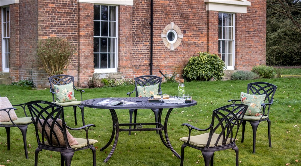 The table and chairs in the garden at Gunby Old Rectory in Skegness, Lincolnshire