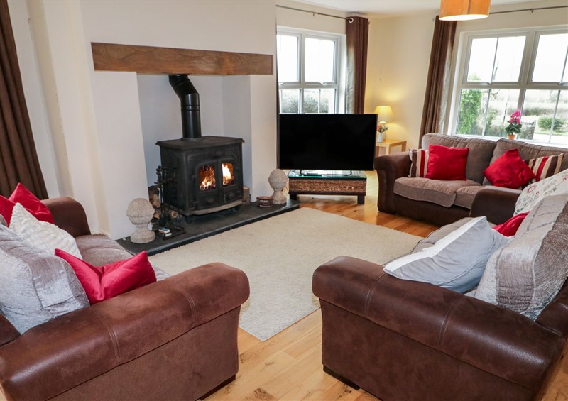 Relax in the living area (photo 2) at Gunns Cottage, Enniskillen