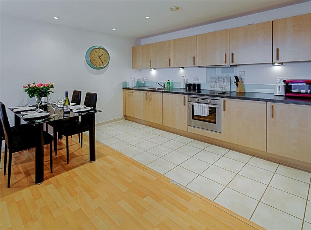 Fully appointed kitchen with dining area at The Two Bedroom A, 