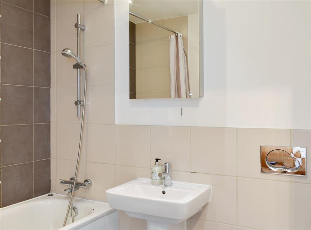 Contemporary bathroom with shower over bath at The Two Bedroom Balcony View A, 