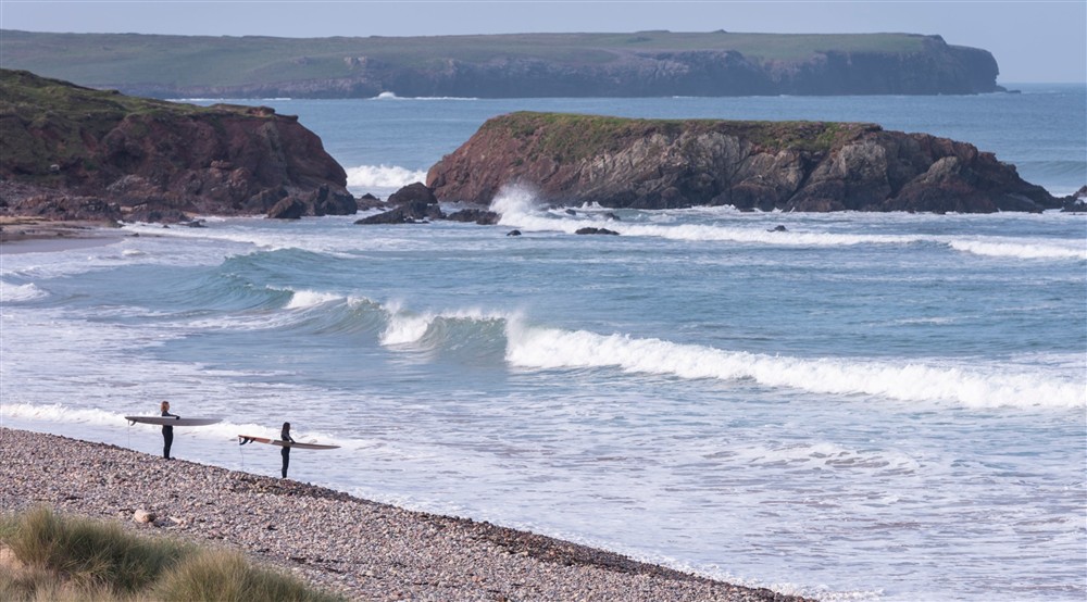 Surfers at Gupton Farm Surf Lodge in Pembroke, Pembrokeshire