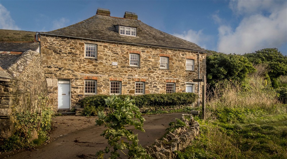The exterior of Guys cottage (left) and neighbouring Quin Cottage, Cornwall at Guy's Cottage in Port Quin, Cornwall