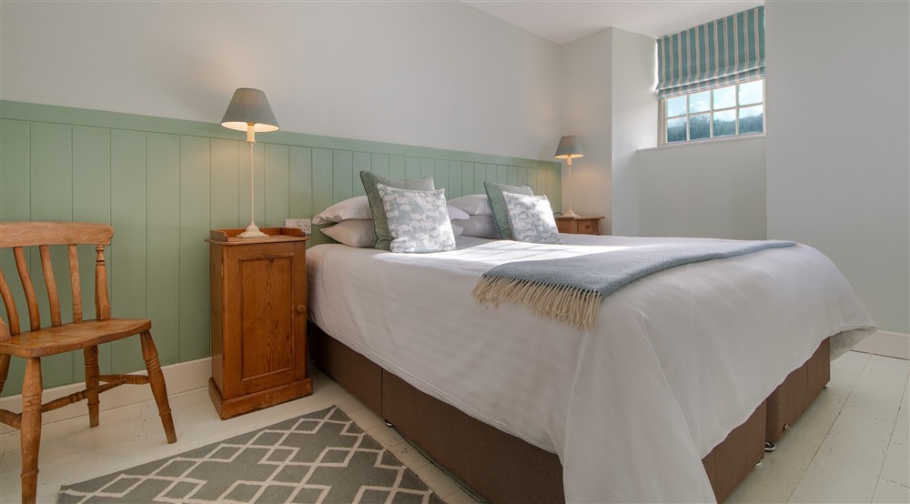 The mezzanine double bedroom at Guy's Cottage in Port Quin, Cornwall