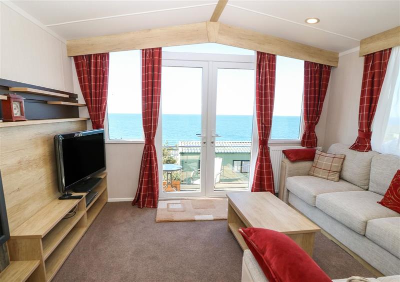 Relax in the living area at Gwel Y Mor, Llanaber