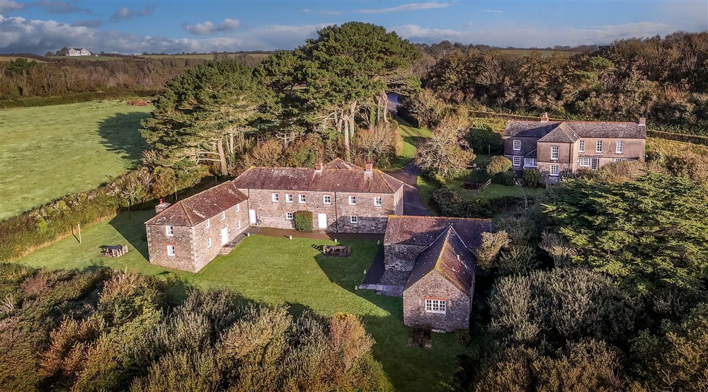 An aerial view of the Gwendra cottages, Gwendra Wartha, Gwendra Granary, Gwendra Dairy Cottage, Mowhay and Hayloft, Cornwall at Gwendra Wartha in Truro, Cornwall