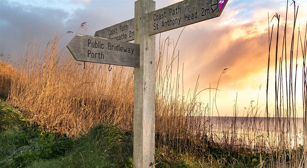 Signpost for the South West Coast Path near Gwendra Wartha, Cornwall at Gwendra Wartha in Truro, Cornwall