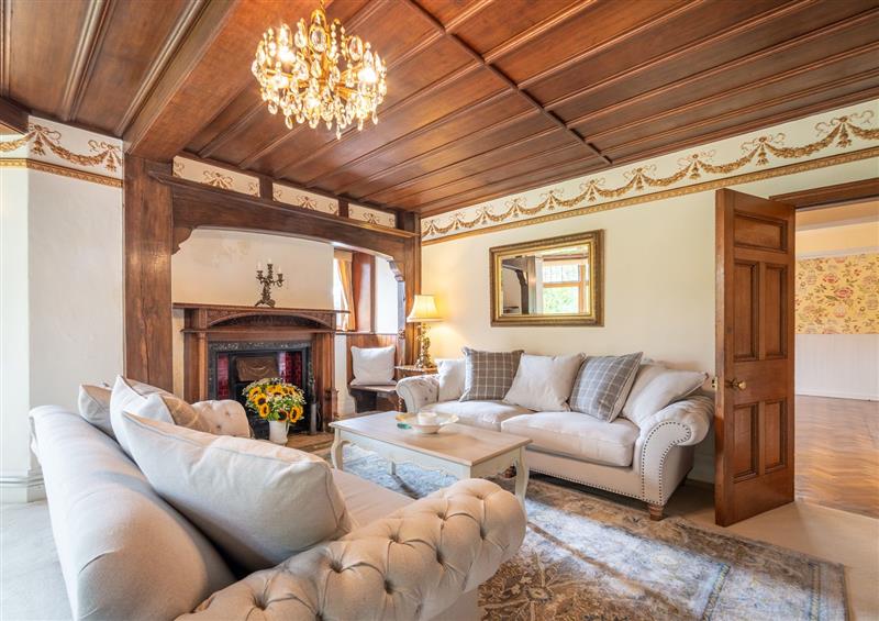 Relax in the living area at Gwern Borter Manor, Rowen near Conwy