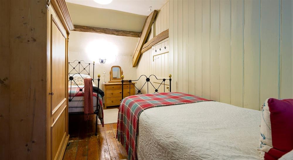 The twin bedroom at Gwernouau Cottage in Betws-y-coed, Gwynedd