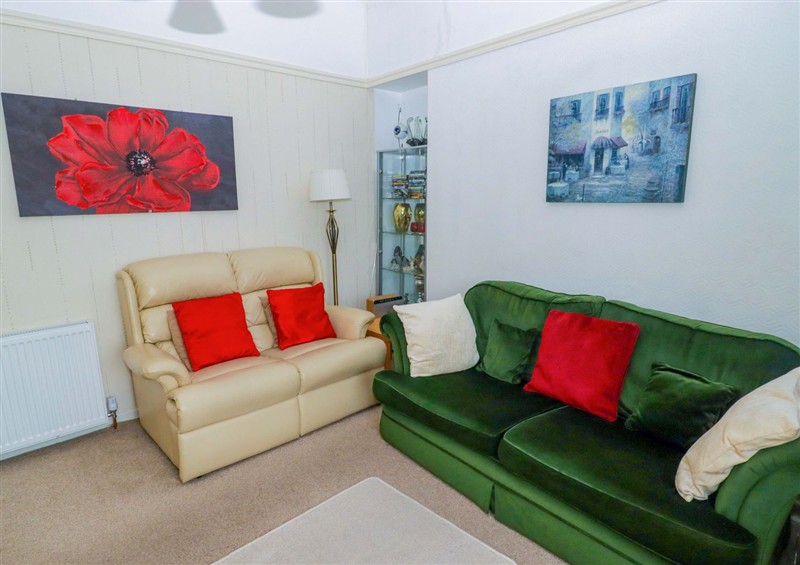 Relax in the living area at Gwylan Maisonette, Tenby