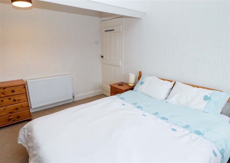 This is a bedroom at Gwylan Maisonette, Tenby