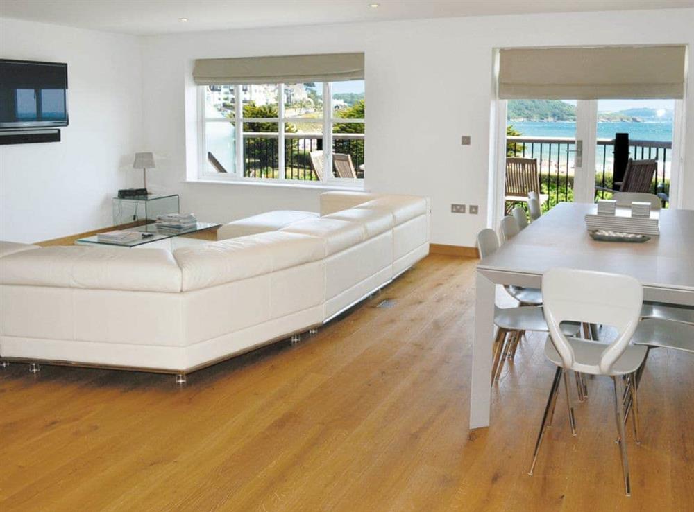 Open plan living/dining room/kitchen at Gylly Beach View in Falmouth, Cornwall