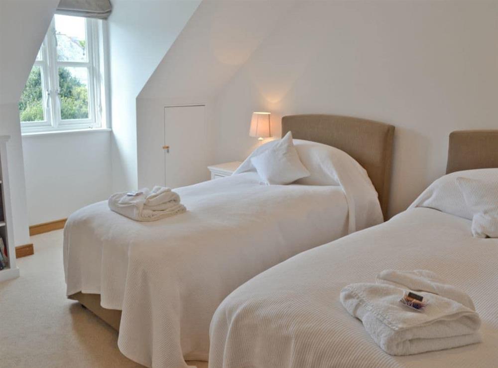 Twin bedroom at Gylly Beach View in Falmouth, Cornwall