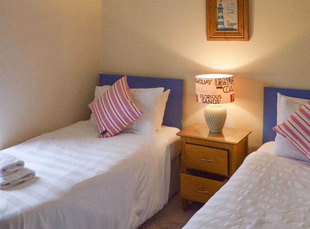 Comfortable twin bedroom at Haddock’s End in Pendeen, Penzance, Cornwall., Great Britain