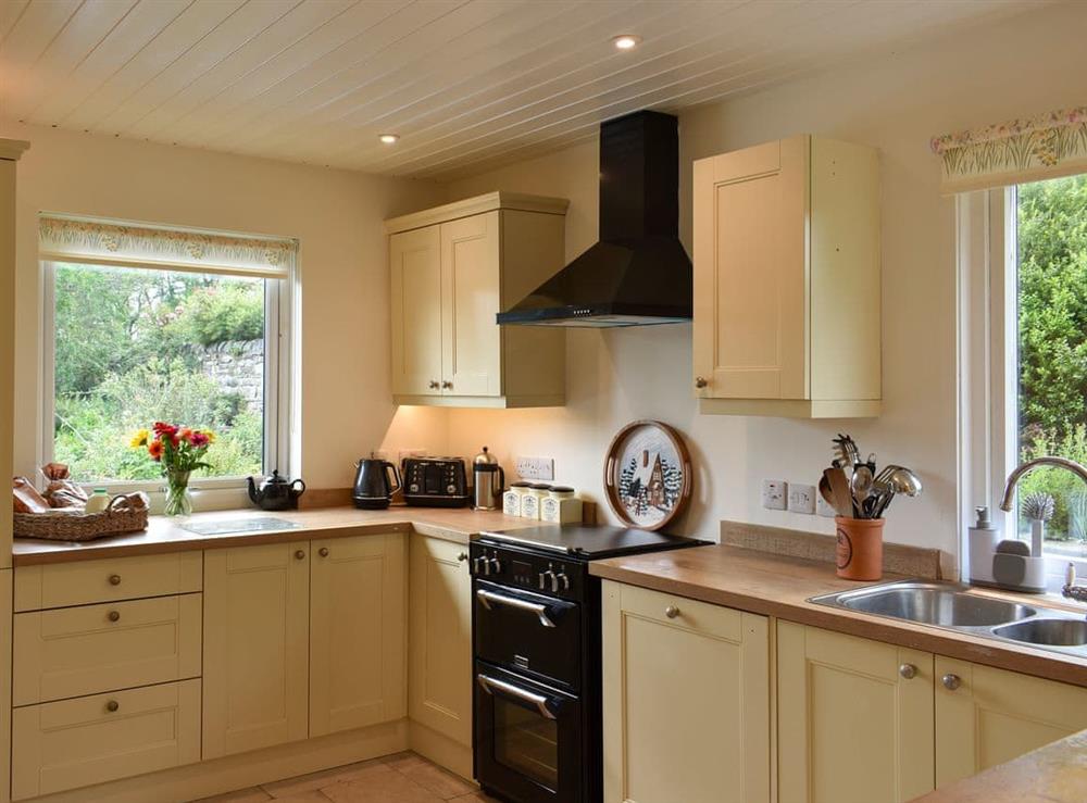 Well-equipped kitchen at Hadrians Garden Cottage in Henshaw, near Hexham, Northumberland