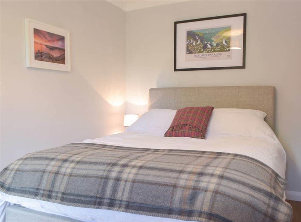 Double bedroom at Hafan Fach Cottage in Stackpole, Dyfed