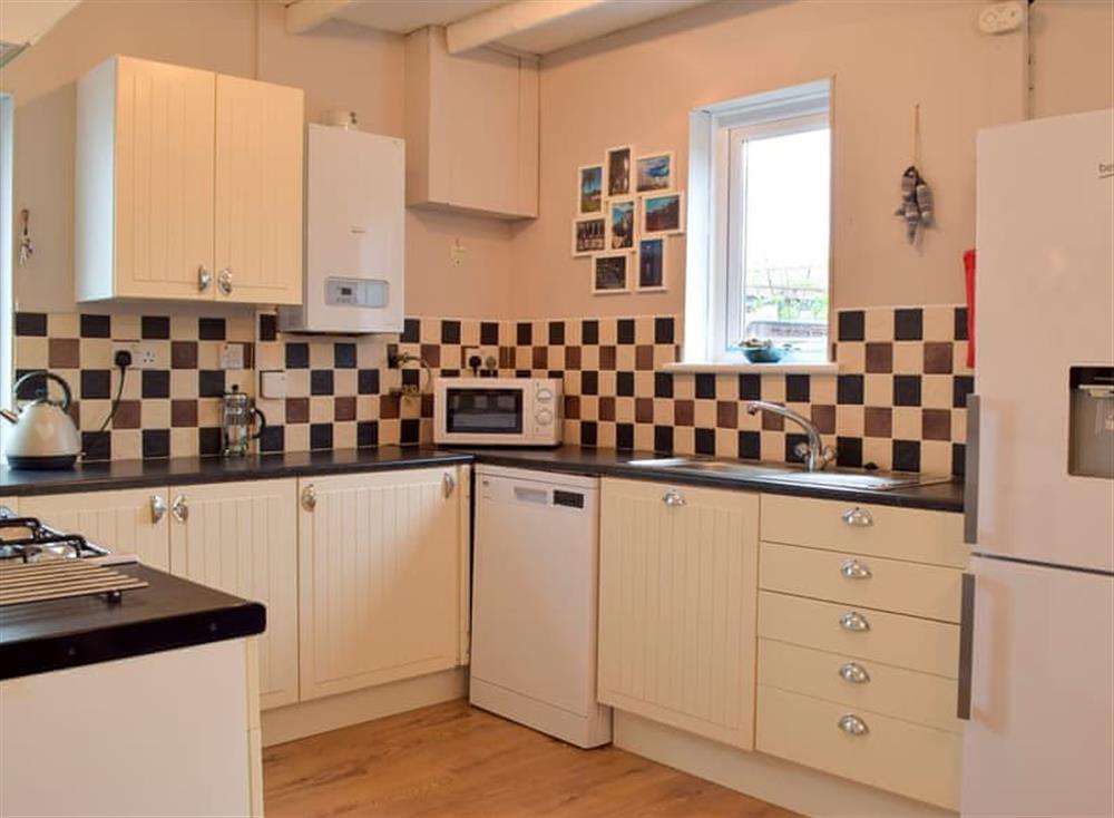 Galley style kitchen at Hafan in Tenby, Pembrokeshire, Dyfed