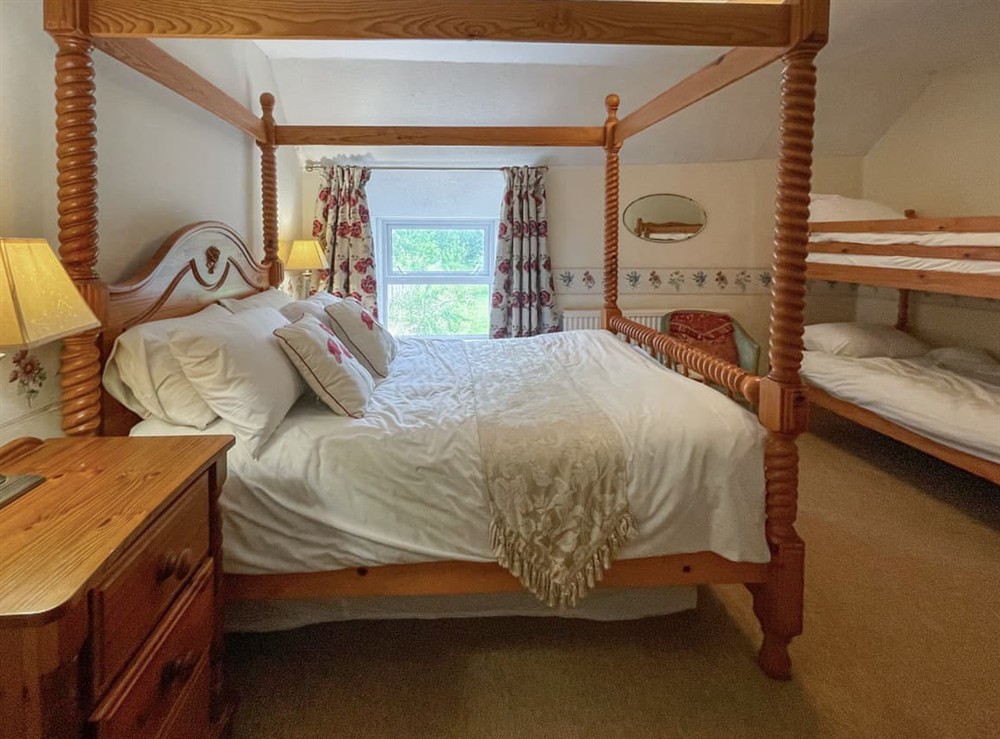 Four Poster the family bedroom With pretty garden views at Hafod Fach in Moylegrove, near Preseli Hills, Dyfed