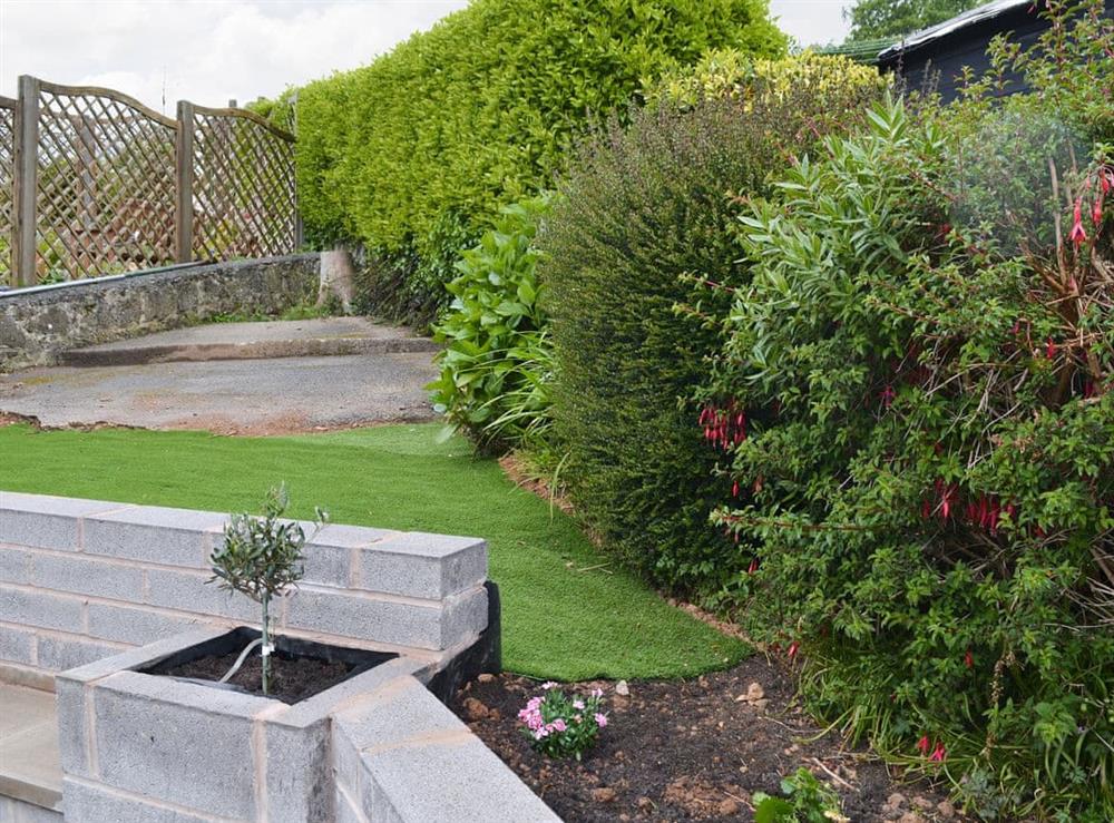 Well-maintained garden area at Hafod y Bryn in Benllech, near Llangefni, Anglesey, Gwynedd