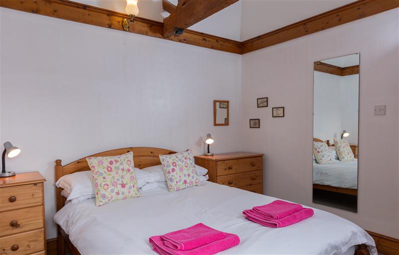 A bedroom in Halcyon Cottage at Halcyon Cottage, Torrington