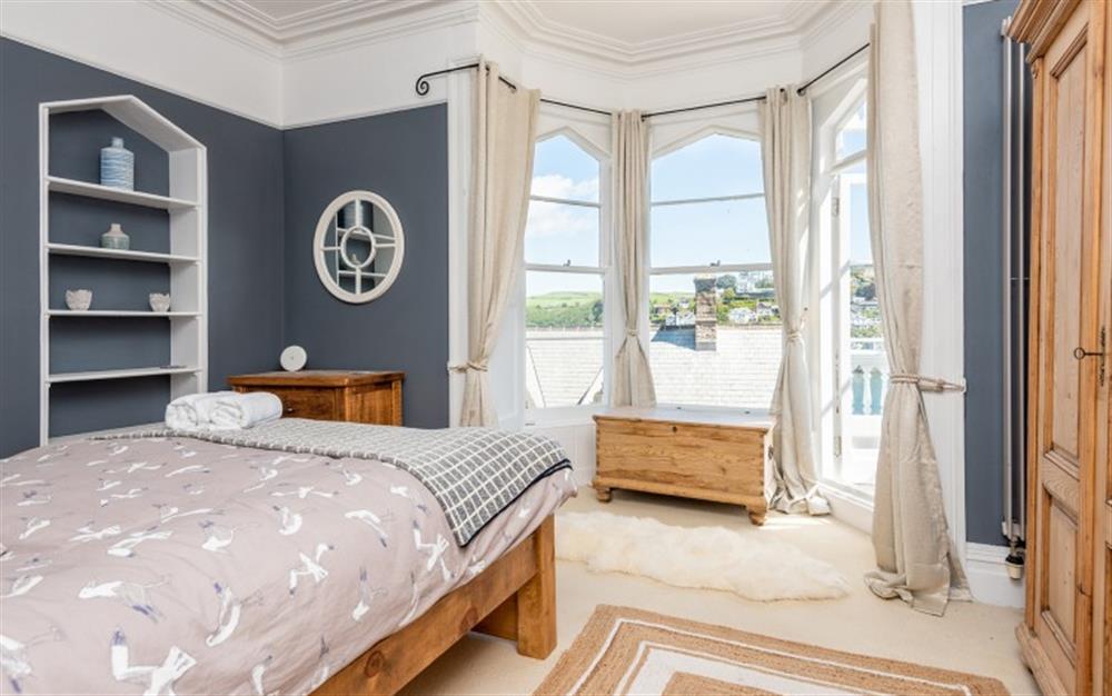 Well-presented master bedroom with large bay windows and river views. at Halcyon in Dartmouth
