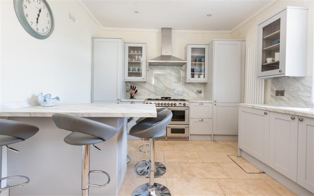 Breakfast stool seating for 6 in the large, fully-equipped contemporary kitchen. at Halcyon House in Dartmouth