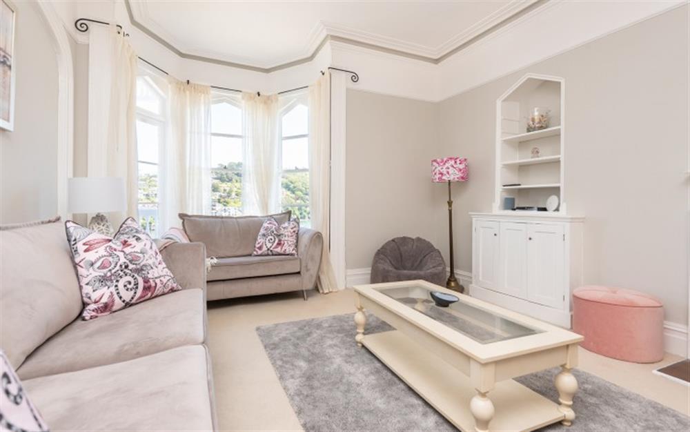 Bright and spacious living room with large bay window. at Halcyon House in Dartmouth