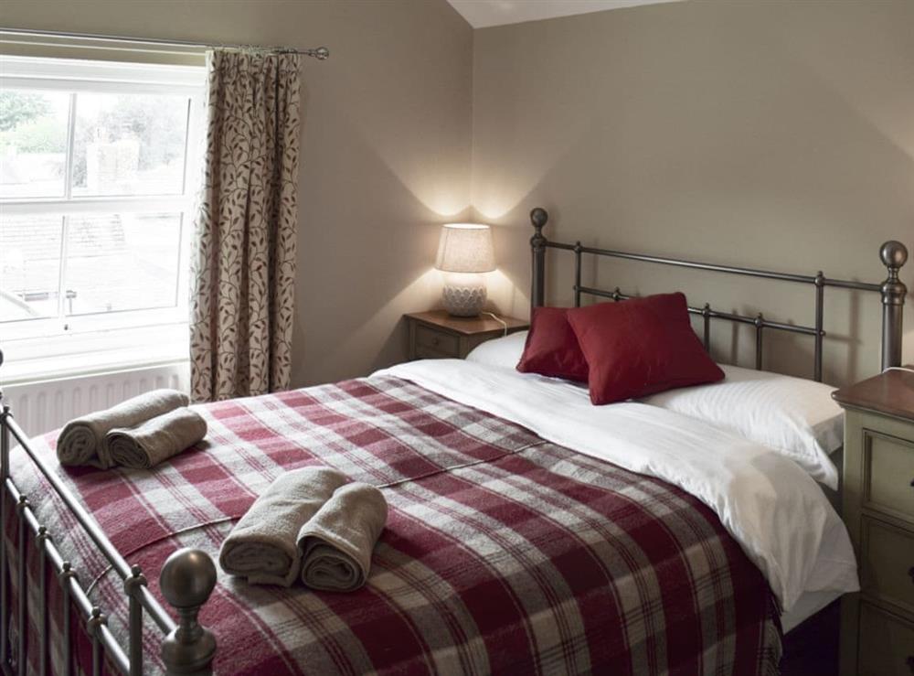 Attractive bedroom with double bed at Halfehill Cottage in Richmond, North Yorkshire
