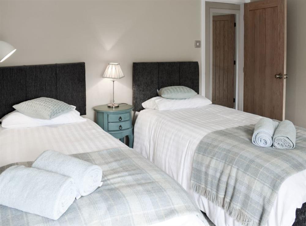 Cosy bedroom with twin beds at Halfehill Cottage in Richmond, North Yorkshire