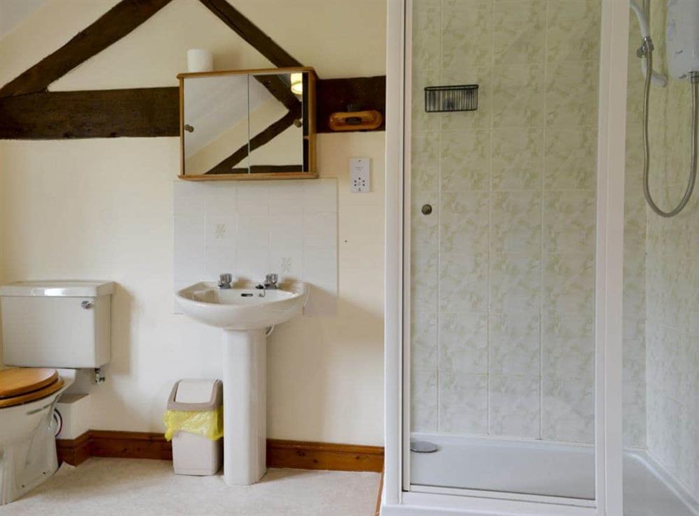 Large bathroom with corner bath and seperate shower (photo 2) at Halford Big Barn in Craven Arms, Shropshire