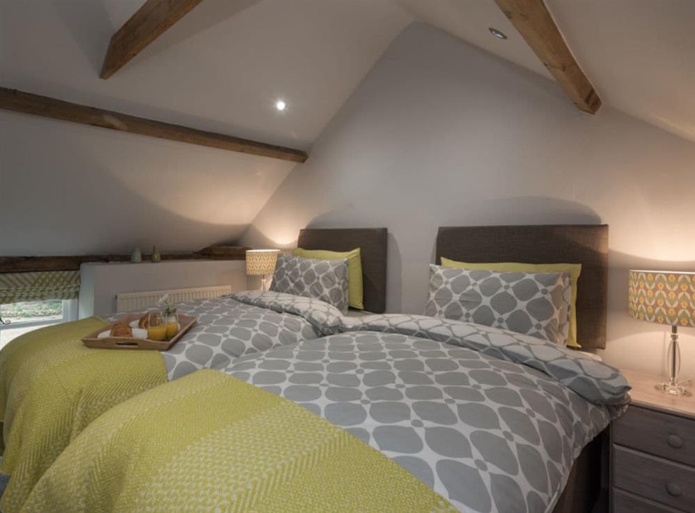 Twin bedroom at Hall Farm Barn in Lamas, near Buxton, Norfolk