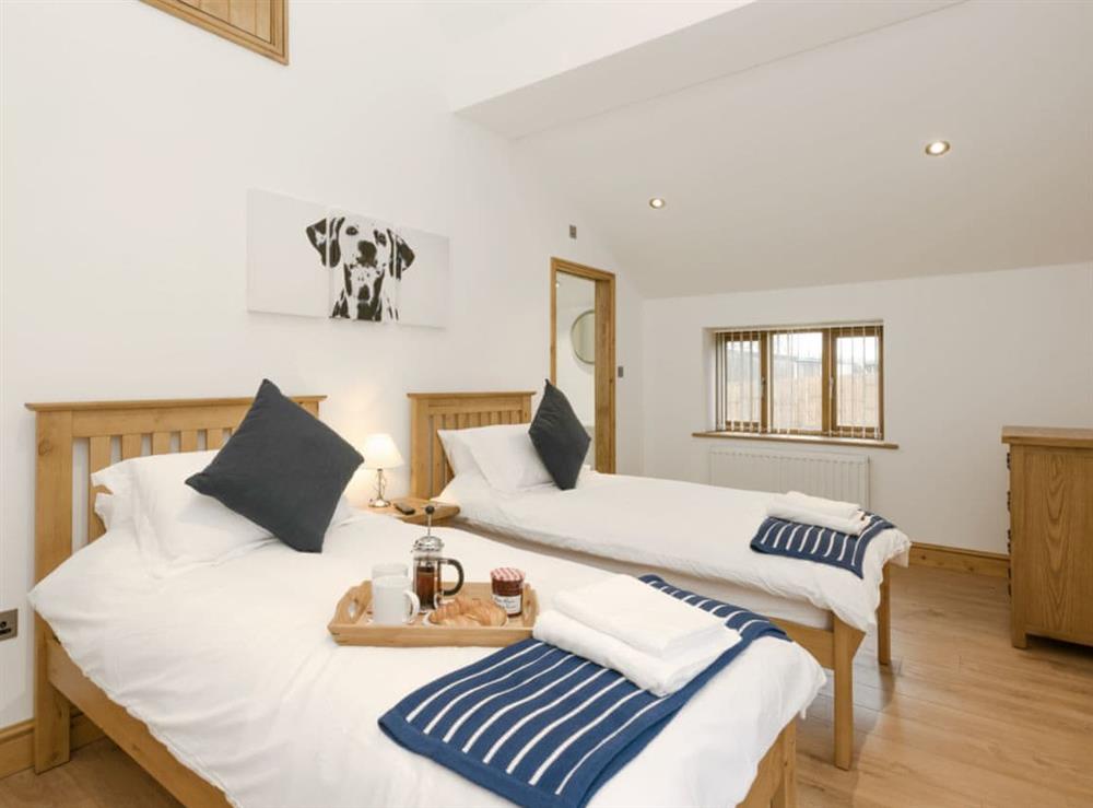 Attractive twin bedroom at The Great South Barn, 