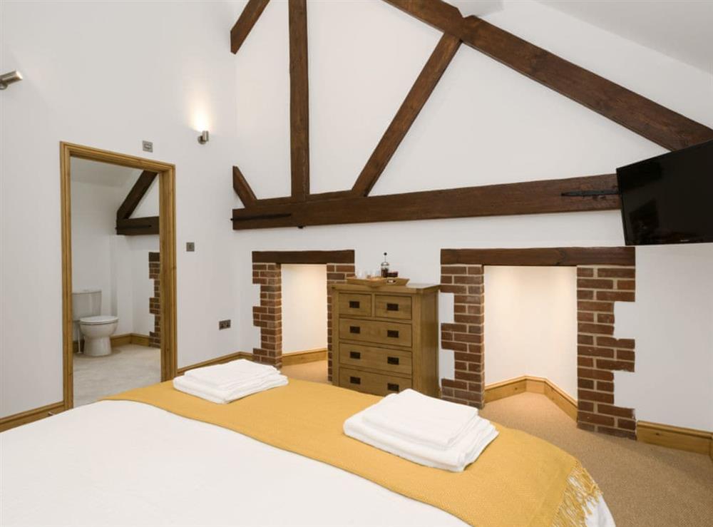 Characterful double bedroom with en-suite at The Great South Barn, 