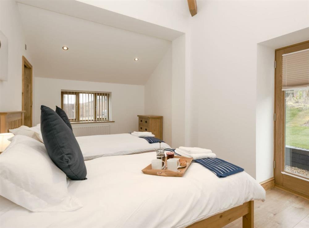 Comfortable twin bedroom at The Great South Barn, 