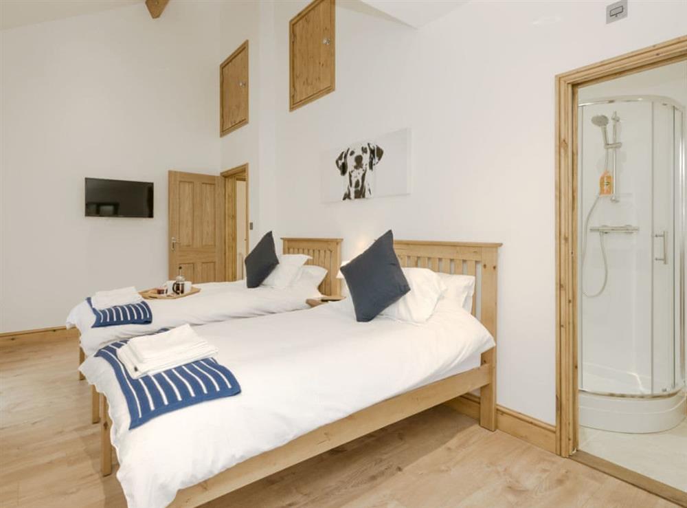 Large twin bedroom at The Great South Barn, 