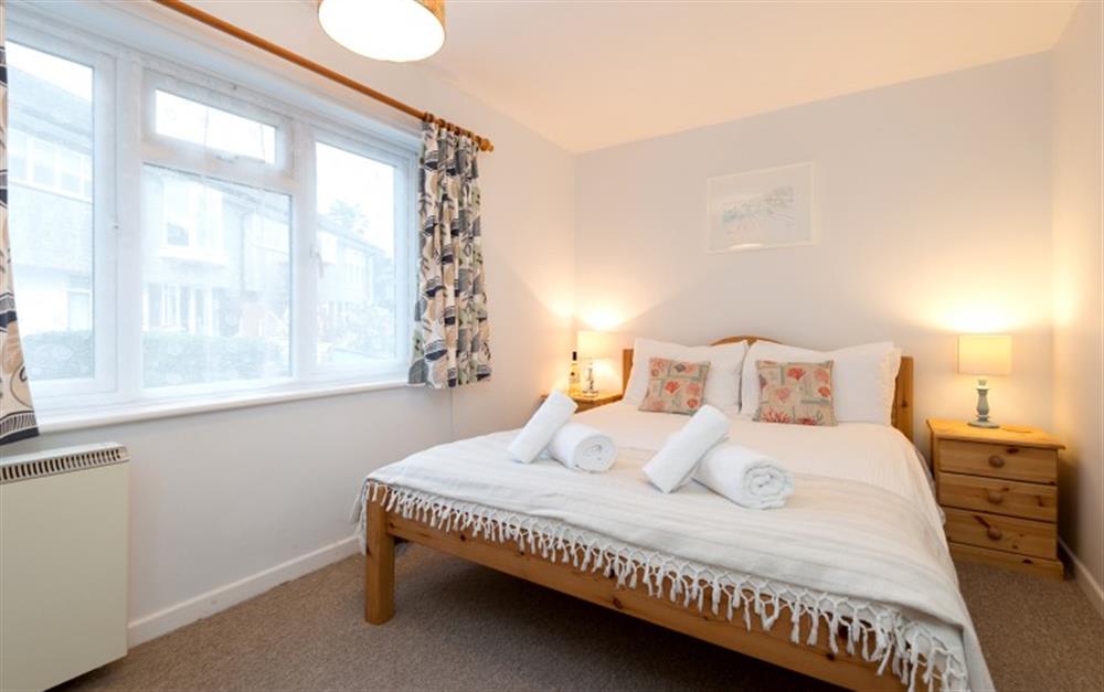 The master bedroom is bright and airy and has a 5ft double bed. at Halliards in Helford Passage