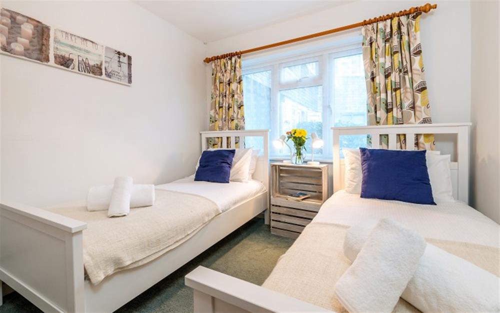 The second bedroom has twin beds.  at Halliards in Helford Passage