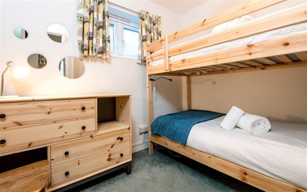 The third bedroom has adult size bunk beds. at Halliards in Helford Passage