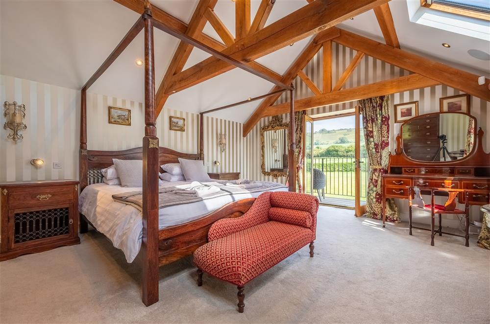 First floor: The master bedroom with en-suite bathroom and private balcony at Ham Farm, Sydling St Nicholas