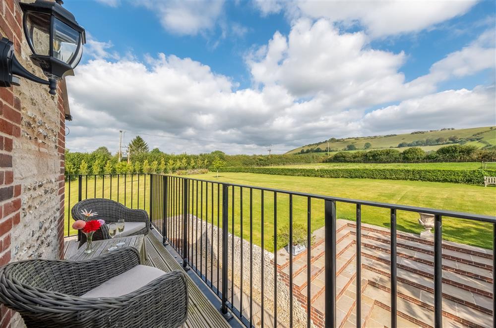 First floor: The private balcony off the master bedroom with outstanding rural views at Ham Farm, Sydling St Nicholas